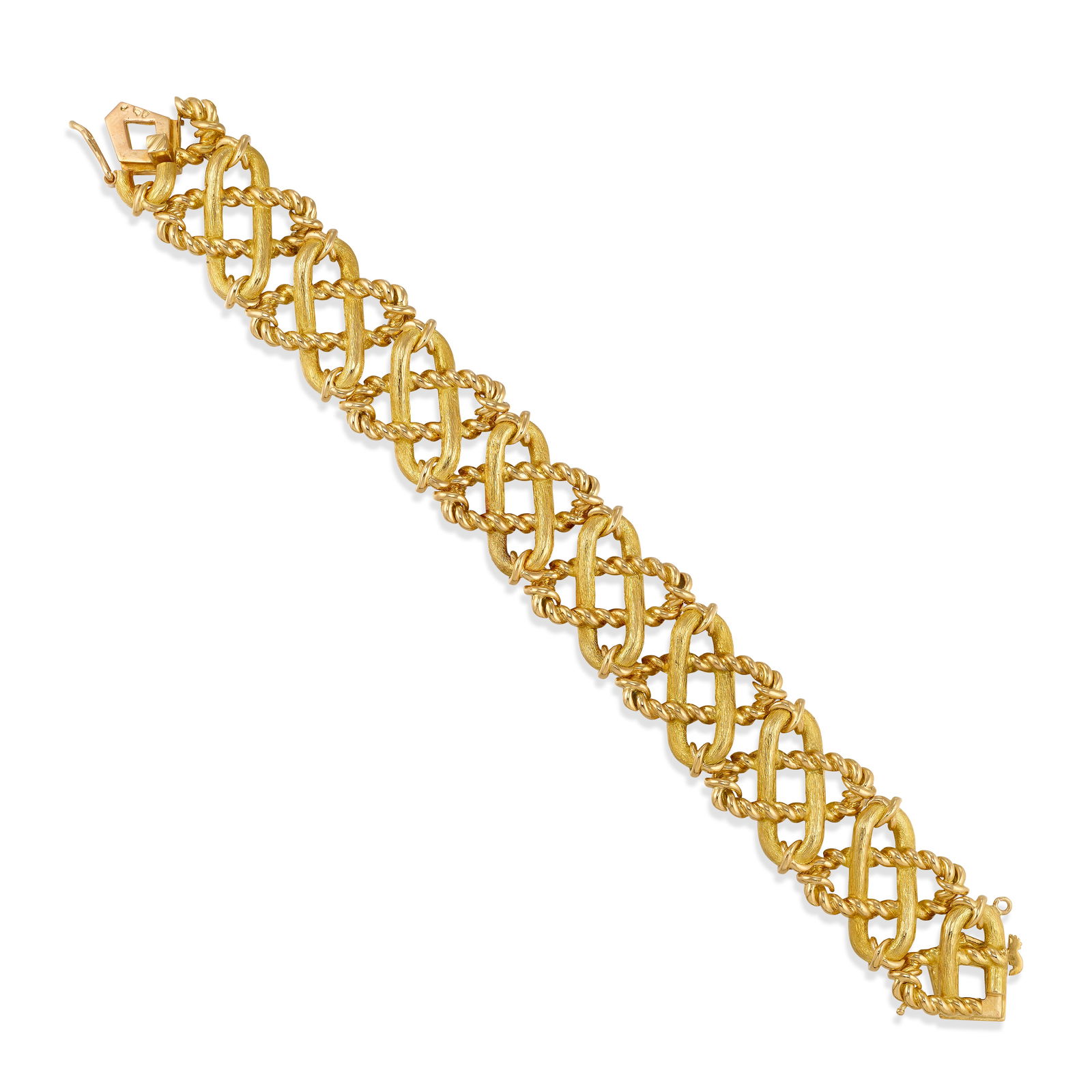 SCHLUMBERGER FOR TIFFANY & CO.: AN 18K GOLD BRACELET: SCHLUMBERGER FOR TIFFANY & CO.: AN 18K GOLD BRACELETOf a fancy link design; signed Schlumberger; signed Tiffany & Co.; with French assay marks; length 6 3/4 in.; width 3/4 in.Footnotes:OVERALL