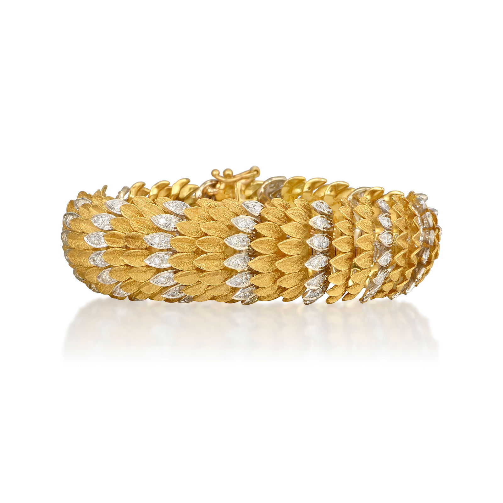 AN 18K BICOLOR GOLD AND DIAMOND BRACELET: AN 18K BICOLOR GOLD AND DIAMOND BRACELETComposed of rows of yellow and white gold feathers, accented with single-cut diamonds; with maker's mark; estimated total weight 3.10 carats; length 7 1/4
