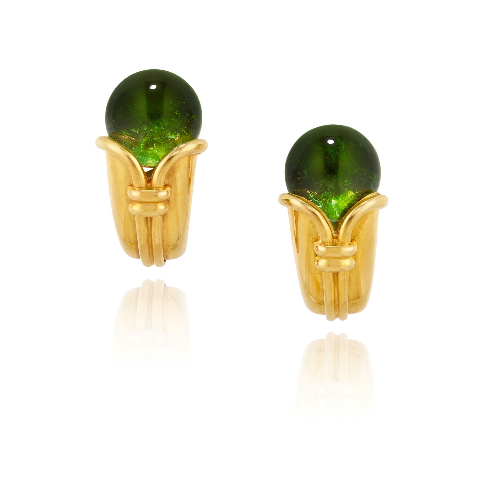 BULGARI: A PAIR OF 18K GOLD AND GREEN TOURMALINE 'CORNUCOPIA' EARRINGS: BULGARI: A PAIR OF 18K GOLD AND GREEN TOURMALINE 'CORNUCOPIA' EARRINGSSet with round cabochon green tourmalines; signed Bulgari; with Italian registered trademark; measures 7/8 x 1/2