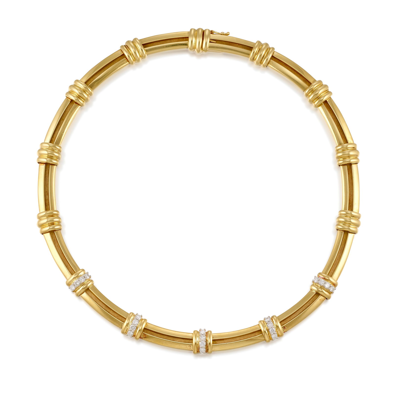 TIFFANY & CO.: AN 18K GOLD, PLATINUM AND DIAMOND 'ATLAS' NECKLACE: TIFFANY & CO.: AN 18K GOLD, PLATINUM AND DIAMOND 'ATLAS' NECKLACE A linked collar, with stations set with round brilliant-cut diamonds; signed Tiffany & Co.; 1995; estimated total diamond weight 1.40