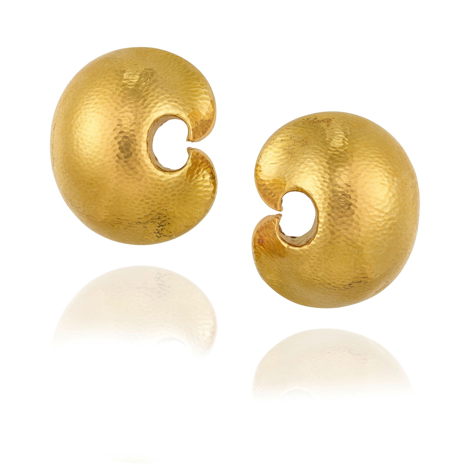 DAVID WEBB: A PAIR OF 18K GOLD 'CRESCENT' EARCLIPS: DAVID WEBB: A PAIR OF 18K GOLD 'CRESCENT' EARCLIPSOf hammered gold; signed Webb; measures 1 1/2 x 1 1/4 in.Footnotes:Lots 101 - 127A Private Collection of Jewelry by David Webb and Andrew Clunn Lots