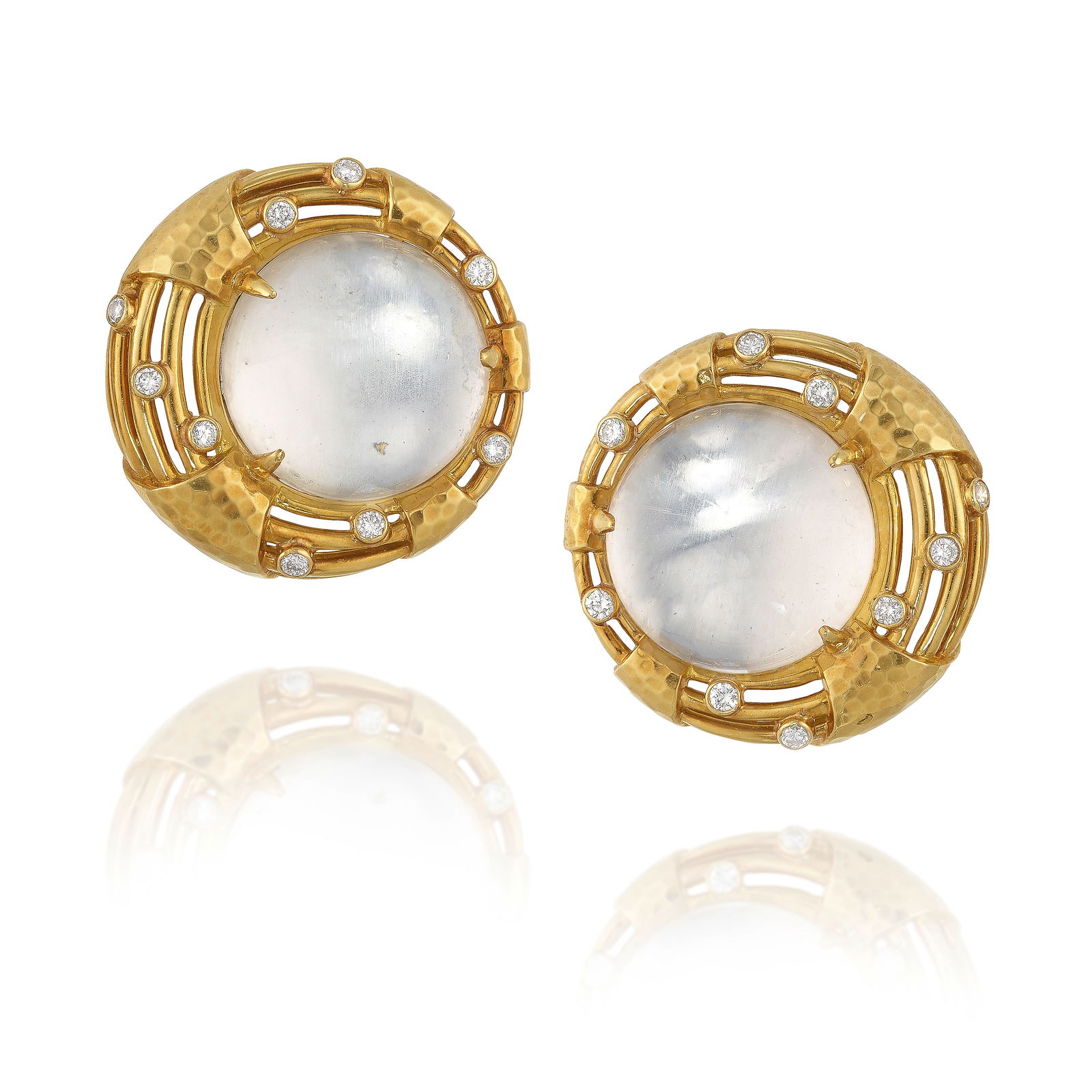 ANDREW CLUNN: A PAIR OF 18K GOLD, ROCK CRYSTAL AND DIAMOND EARCLIPS: ANDREW CLUNN: A PAIR OF 18K GOLD, ROCK CRYSTAL AND DIAMOND EARCLIPS Comprising round cabochon rock crystal, accented with round brilliant-cut diamonds; signed A. Clunn; estimated total diamond weight
