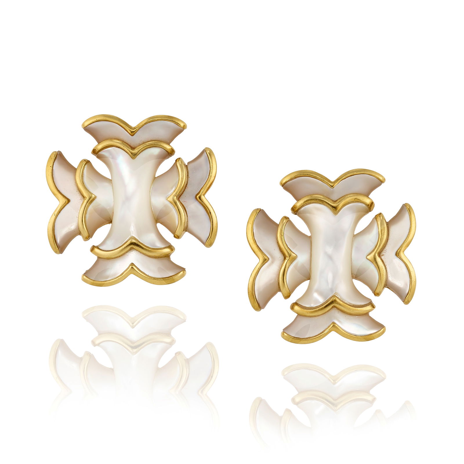 ANGELA CUMMINGS: A PAIR OF 18K GOLD AND MOTHER-OF-PEARL EARCLIPS: ANGELA CUMMINGS: A PAIR OF 18K GOLD AND MOTHER-OF-PEARL EARCLIPS Comprising carved mother-of-pearl inlay; signed Angela Cummings; measures 15/16 in. Footnotes: Please note this item cannot be shipped