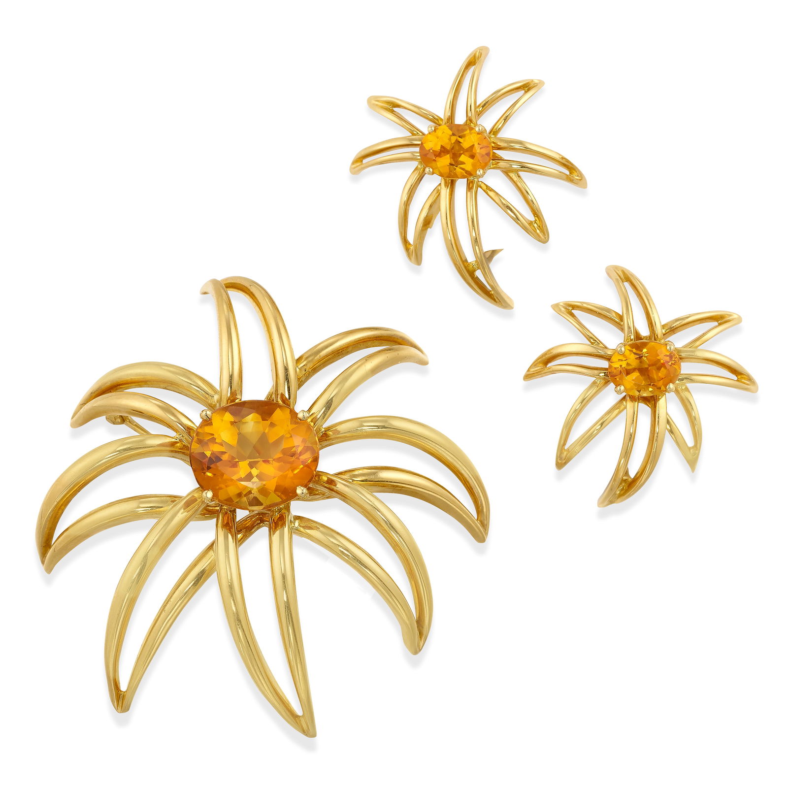 TIFFANY & CO.: AN 18K GOLD AND CITRINE 'FIREWORKS' BROOCH AND EARCLIP SET, 1994: TIFFANY & CO.: AN 18K GOLD AND CITRINE 'FIREWORKS' BROOCH AND EARCLIP SET, 1994Designed as exploding fireworks, all centering oval-shaped citrines, all signed Tiffany & Co., brooch measures 2 in,