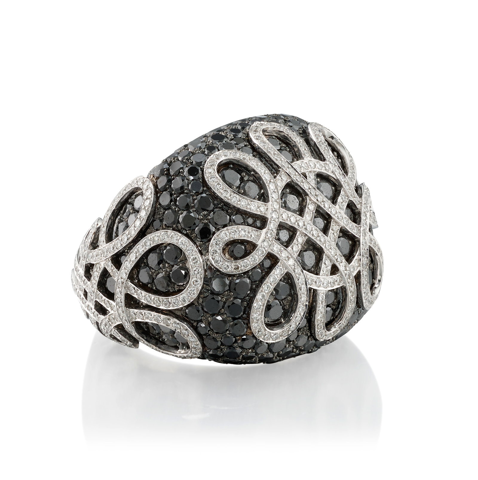 LEVIEV: AN 18K WHITE GOLD, COLORED DIAMOND AND DIAMOND RING: LEVIEV: AN 18K WHITE GOLD, COLORED DIAMOND AND DIAMOND RING Composed of pavé-set, round brilliant-cut black diamonds, accented with round brilliant-cut diamonds; signed Leviev; estimated total d