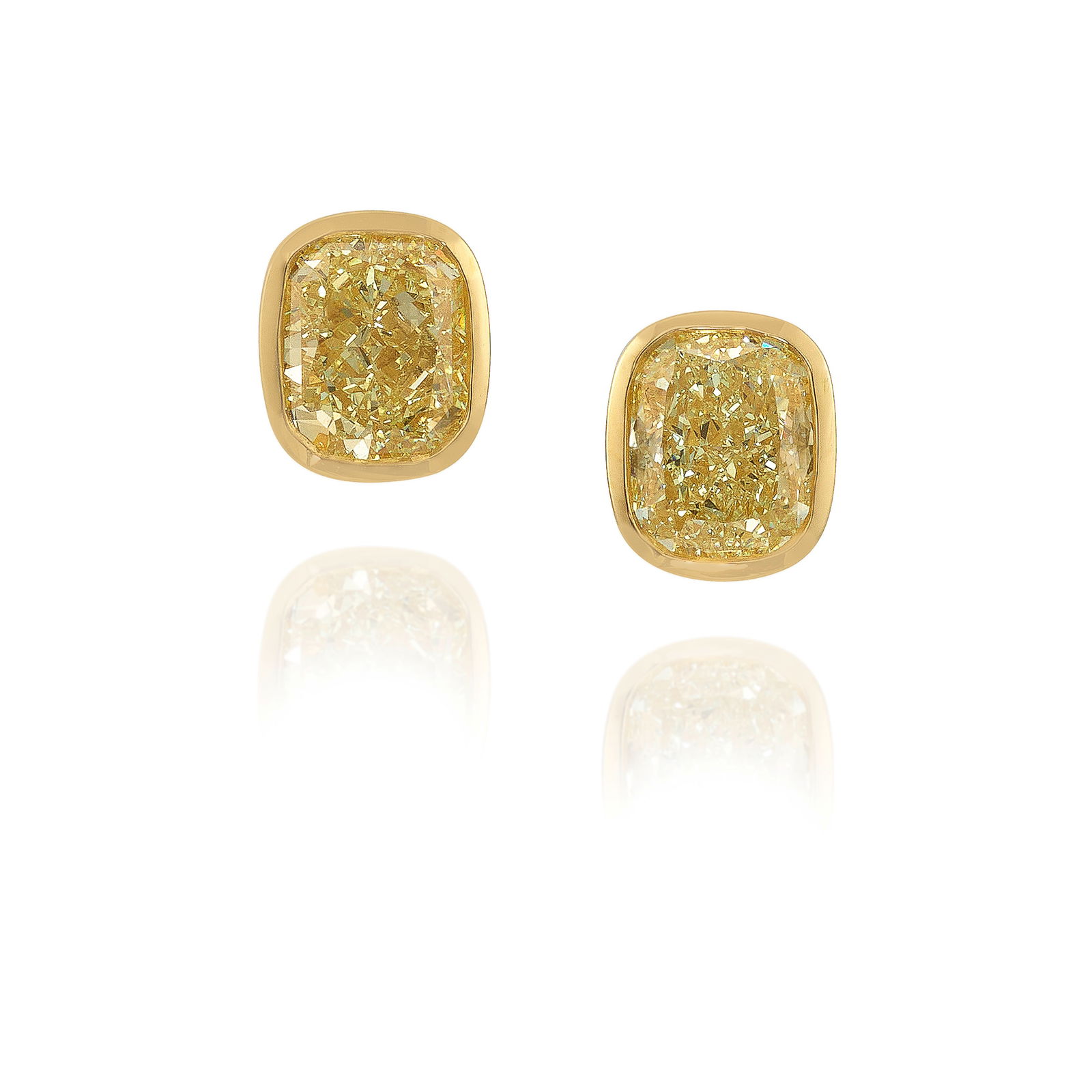 A PAIR OF 18K GOLD AND DIAMOND EARRINGS: A PAIR OF 18K GOLD AND DIAMOND EARRINGSComprising cushion-shaped, modified brilliant-cut diamonds, weighing 2.00 carats and 2.03 carats, respectively; measures 3/8 x 5/16 in.Footnotes:Accompanied by