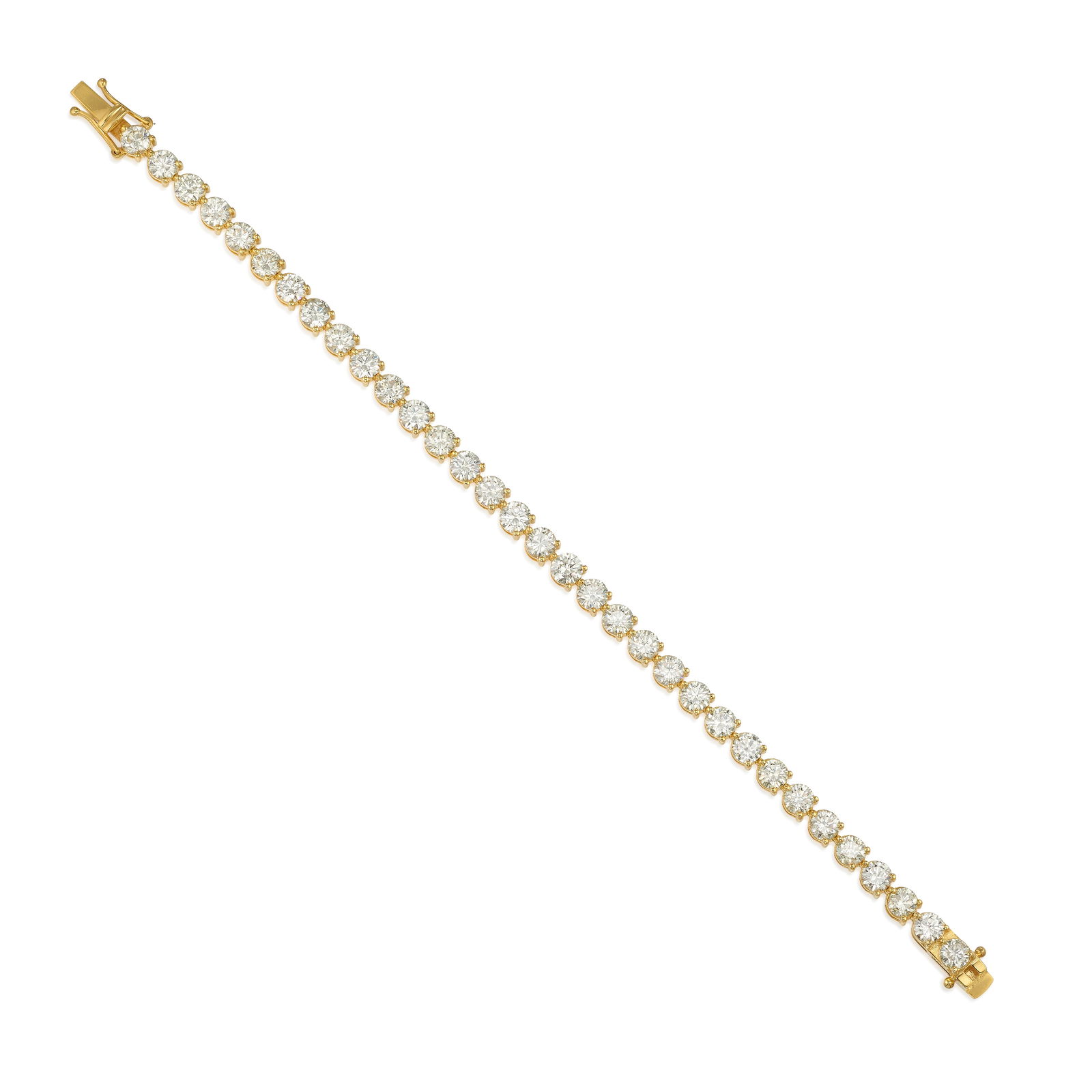 A 14K GOLD AND DIAMOND BRACELET: A 14K GOLD AND DIAMOND BRACELET Comprising round brilliant-cut diamonds; estimated total diamond weight 11.75 carats; length 7 1/4 in. Footnotes: OVERALL CONDITION: Metal stamped and tested with XRF (
