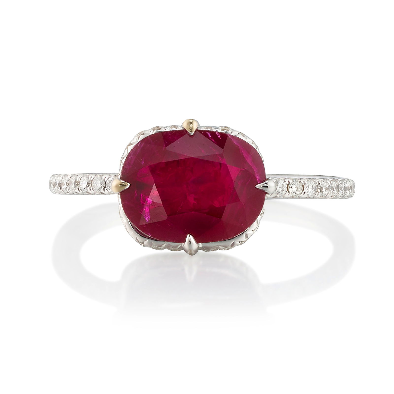 AN 18K WHITE GOLD, RUBY AND DIAMOND RING: AN 18K WHITE GOLD, RUBY AND DIAMOND RINGCentering a cushion-shaped, mixed-cut ruby, weighing 2.02 carats, accented with round brilliant-cut diamonds; size 6 3/4Footnotes:Accompanied by GIA Report