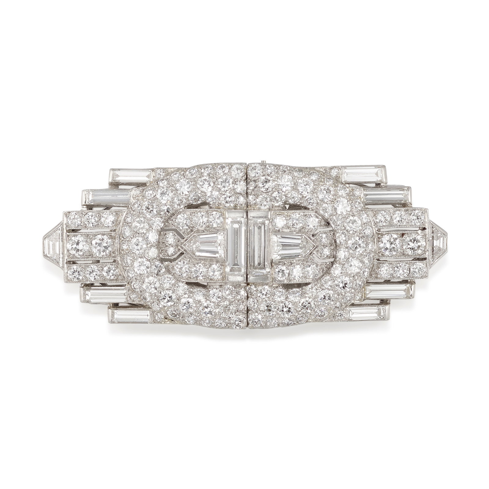TIFFANY & CO.: A PAIR OF PLATINUM AND DIAMOND CLIPS/BROOCH, CIRCA 1930: TIFFANY & CO.: A PAIR OF PLATINUM AND DIAMOND CLIPS/BROOCH, CIRCA 1930Of geometric design, each clip centering a bullet-shaped diamond, and further enhanced by baguette, tapered baguette,