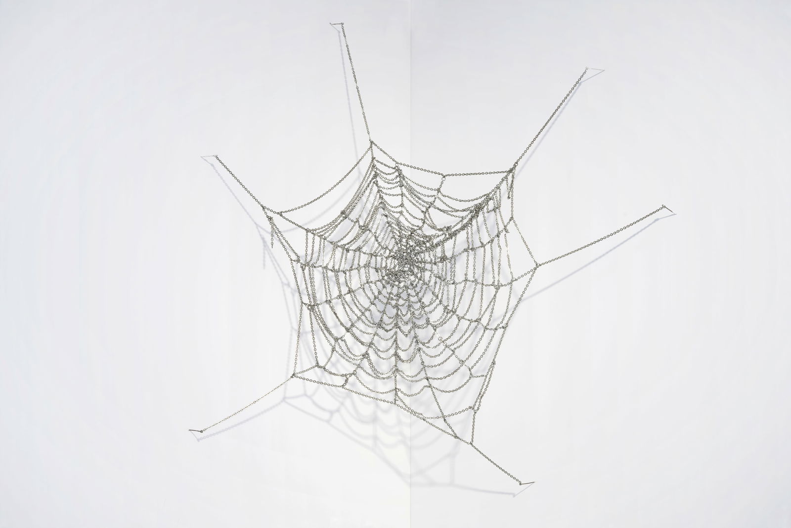 JIM HODGES (B. 1957) How Happy We Will Be (Executed in 1997): JIM HODGES (B. 1957) How Happy We Will Be white brass chains 35 x 41cm (13 3/4 x 16 1/8in). Executed in 1997 Footnotes: Provenance CRG Gallery, New York Acquired from t