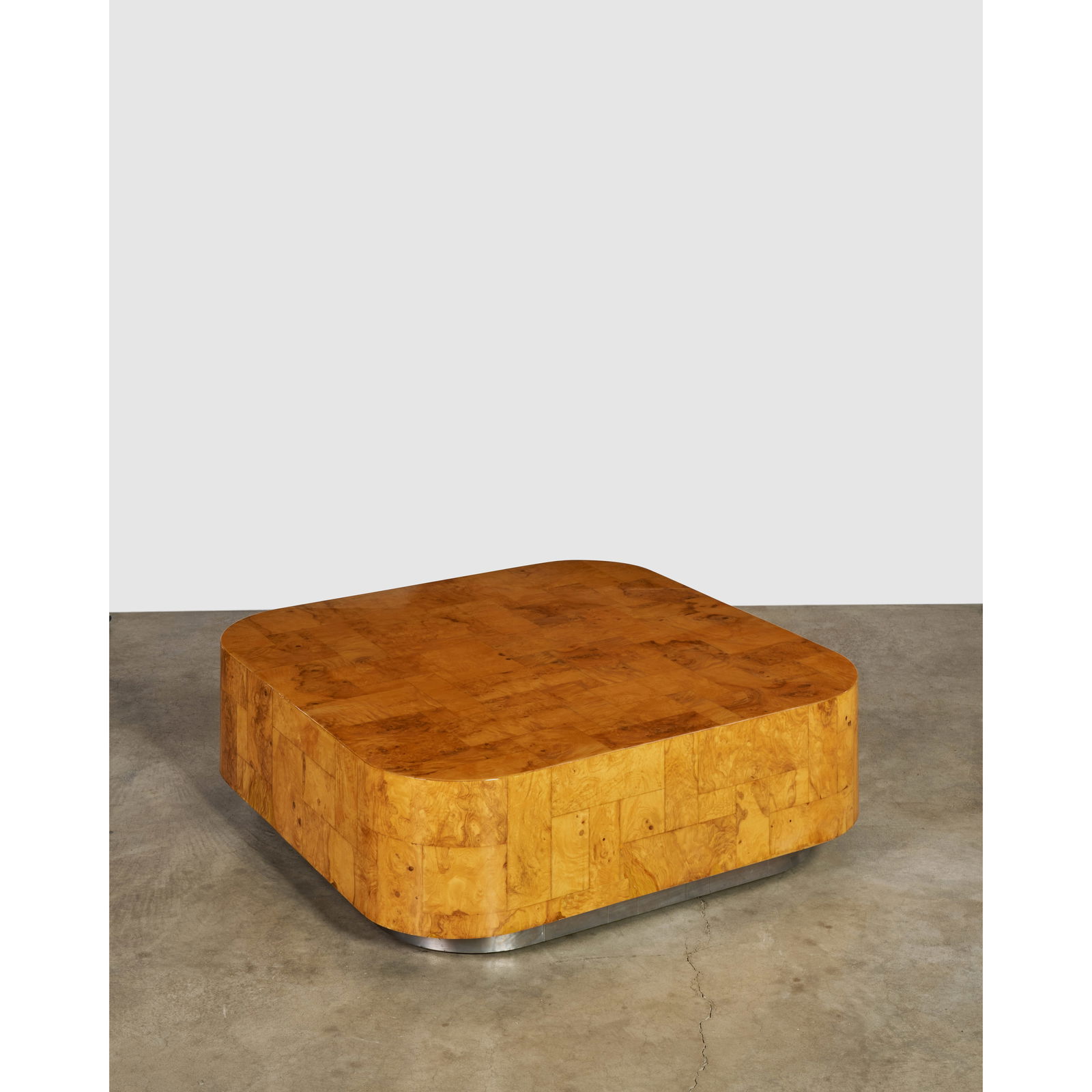 PAUL EVANS (1931-1987) 'Curved 500' Coffee Table1970-75for Directional, walnut burl, chrome-plat...: PAUL EVANS (1931-1987) 'Curved 500' Coffee Table 1970-75 for Directional, walnut burl, chrome-plated steel height 15 1/2in (39.4cm); width 47 7/8in (121.6cm); length 47 7/8in (121.6cm) Footnotes: Lite