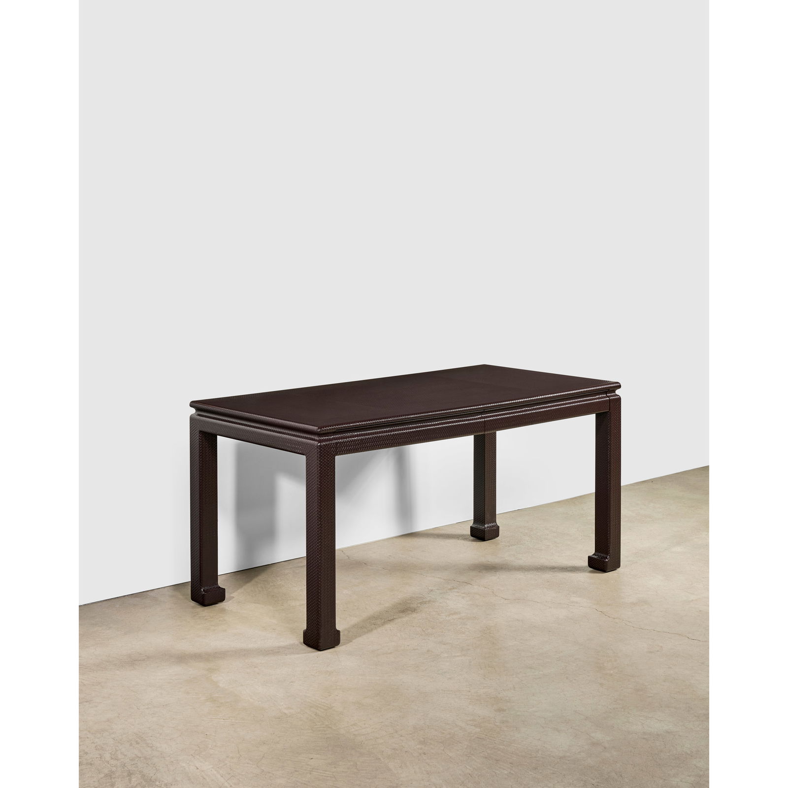 KARL SPRINGER (1931-1991) 'Ming' Writing Deskcirca 1980for Karl Springer Ltd., embossed textured...: KARL SPRINGER (1931-1991) 'Ming' Writing Desk circa 1980 for Karl Springer Ltd., embossed textured leather, wood height 29 1/2in (75cm); width 59 1/2in (151cm); depth 29 3/4in (76cm) Footnotes: Litera