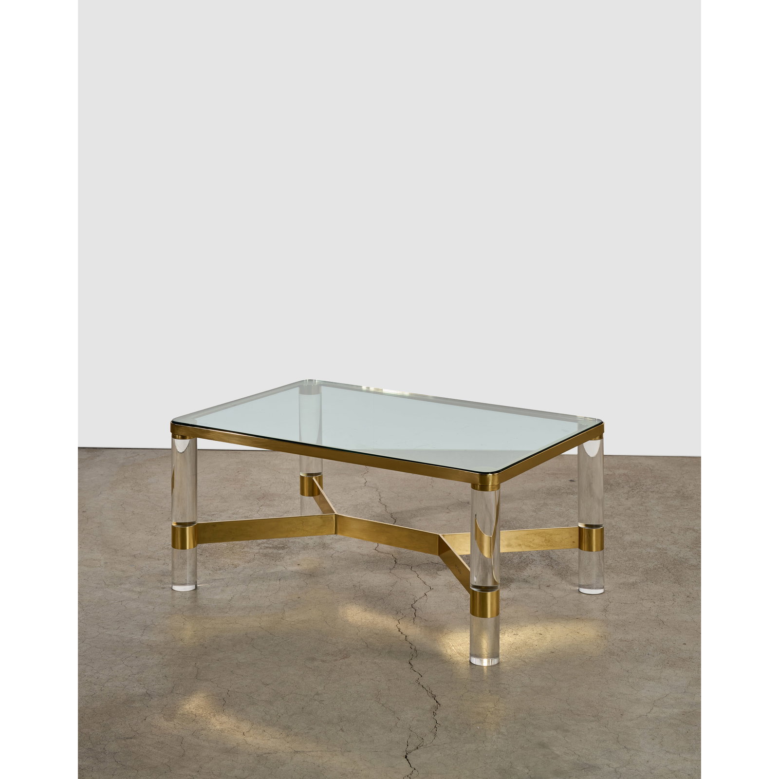 KARL SPRINGER (1931-1991) 'Round Leg Lucite' Coffee tablecirca 1980for Karl Springer Ltd., glass... (1 of 1)