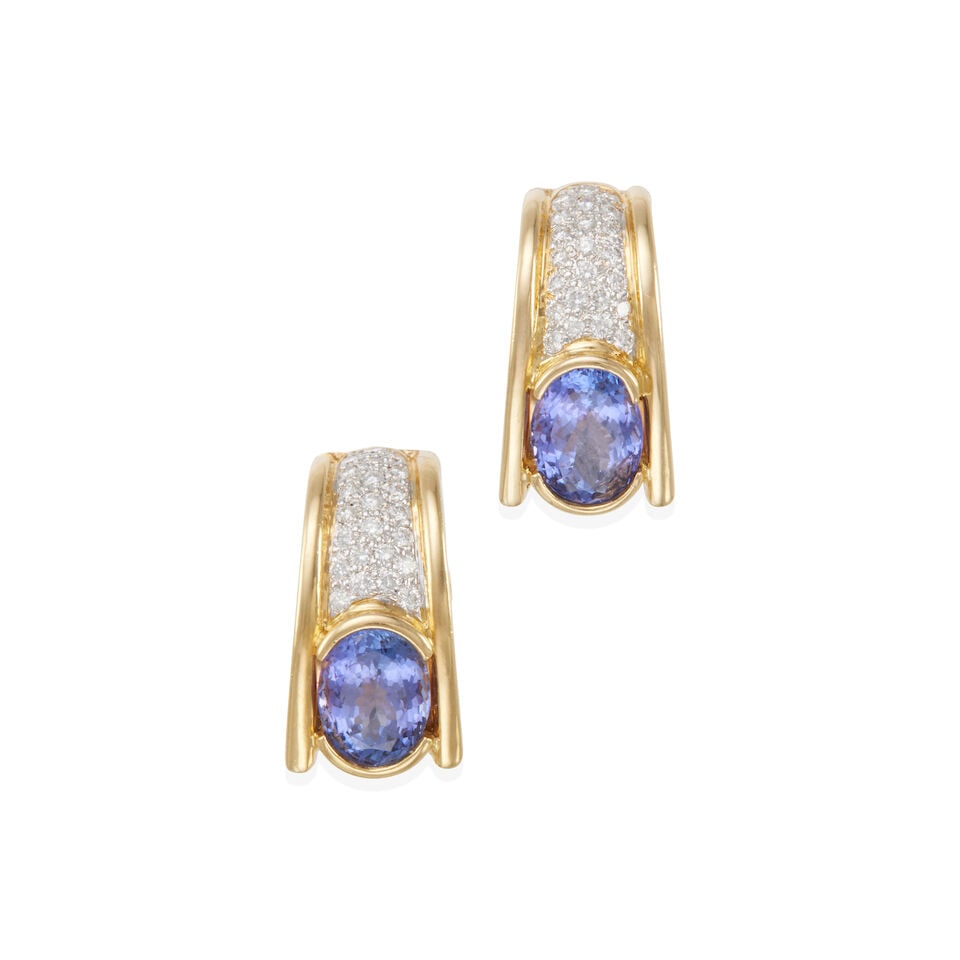 18K BICOLOR GOLD, TANZANITE, AND DIAMOND EAR CLIPS: 18K BICOLOR GOLD, TANZANITE, AND DIAMOND EAR CLIPS • 18k yellow and white gold • 2 oval shape tanzanites weighing approximately 4.60 - 4.65 carats total • Numerous round diamonds