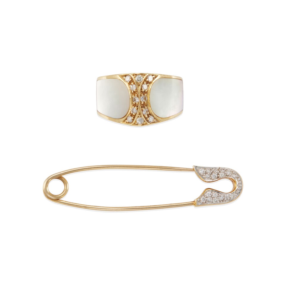 18K GOLD, DIAMOND, AND MOTHER OF PEARL RING AND BROOCH: 18K GOLD, DIAMOND, AND MOTHER OF PEARL RING AND BROOCH • 18k yellow gold ring set with 2 tongue shape tablet mother of pearls, measuring 14.75 x 9.45 mm each in diameter, accented with 12 round