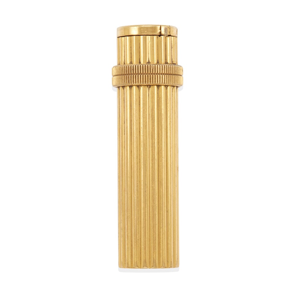 HERMES: GOLD-PLATED LIGHTER: HERMES: GOLD-PLATED LIGHTER • Gold-plated base metal • Signed HERMES, PARIS • Measures 2 5/8 x 3/4 in. • Estimated gross weight: 55.6 grams Footnotes: Overall condition, very g