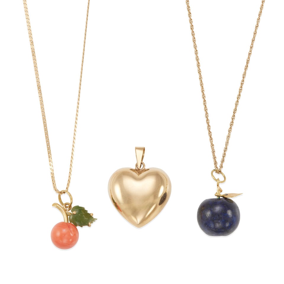 THREE GOLD AND GEM-SET JEWELRY ITEMS: THREE GOLD AND GEM-SET JEWELRY ITEMS • One heart pendant on 14k yellow gold, measures 7/8 x 7/8 in, estimated weight 2.6 grams • One lapis lazuli pendant with 14k yellow gold accent and