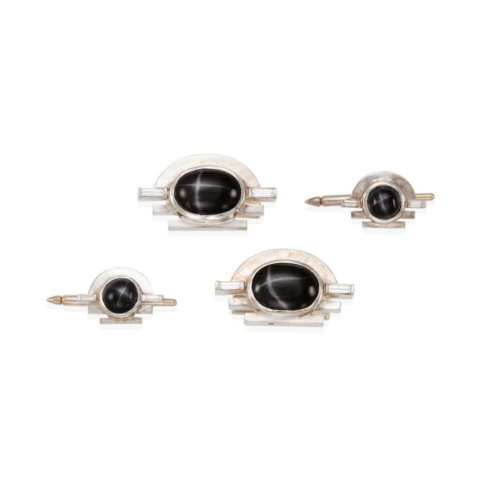 14K GOLD, DIAMOND AND STAR DIOPSIDE DRESS SET: 14K GOLD, DIAMOND AND STAR DIOPSIDE DRESS SET • Pair of cufflinks of 14k white gold with 2 oval star diopsides cabochons and 4 baguette diamonds weighing approximately 0.25 - 0.35 carat total, m