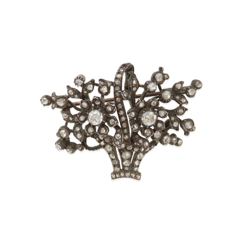 GEORGIAN SILVER AND DIAMOND BROOCH/PENDANT: GEORGIAN SILVER AND DIAMOND BROOCH/PENDANT • Silver • Numerous rose-cut diamonds • Measures 1 1/2 x 1 1/8 in. • Estimated gross weight: 10.6 grams Footnotes: Overall
