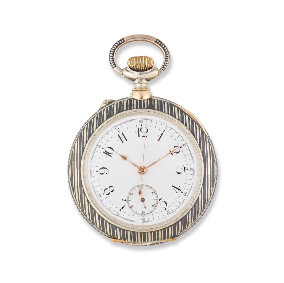 A silver and niello keyless wind open face chronograph pocket watch Chronographe de poche à...: A silver and niello keyless wind open face chronograph pocket watch Chronographe de poche à cadran ouvert en nielle et argent (800) remontoir au pendant Date: Circa 1900 Movement: Swiss lever, cu