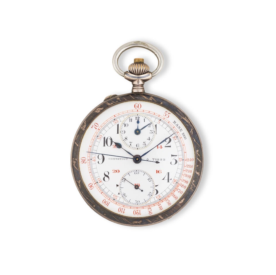 Contetout. A silver and niello open face keyless wind chronograph pocket watch Contetout. Chrono...: Contetout. A silver and niello open face keyless wind chronograph pocket watch Contetout. Chronographe de poche à cadran ouvert en argent (800) et nielle remontoir au pendant Date: Circa 1910 Mov