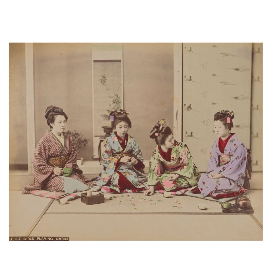 JAPAN Album of 50 tinted albumen photographs of group studies and portrait types (21) and views ... - 2