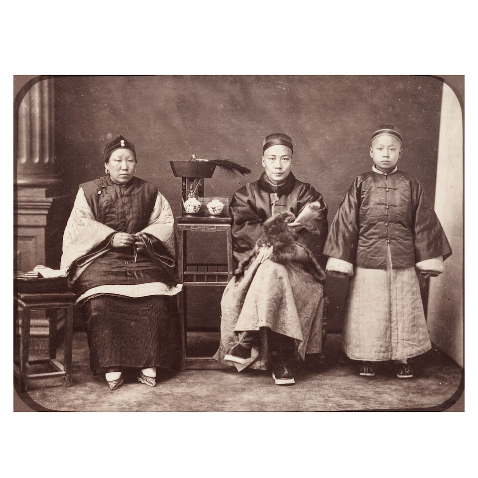 CHINA Five portrait groups of Mandarin, or well-to-do Chinese family groups, and 2 single studio...: CHINA Five portrait groups of Mandarin, or well-to-do Chinese family groups, and 2 single studio portraits of Chinese sitters, albumen prints, 2 laid down on early album sheets (each with albumen prin
