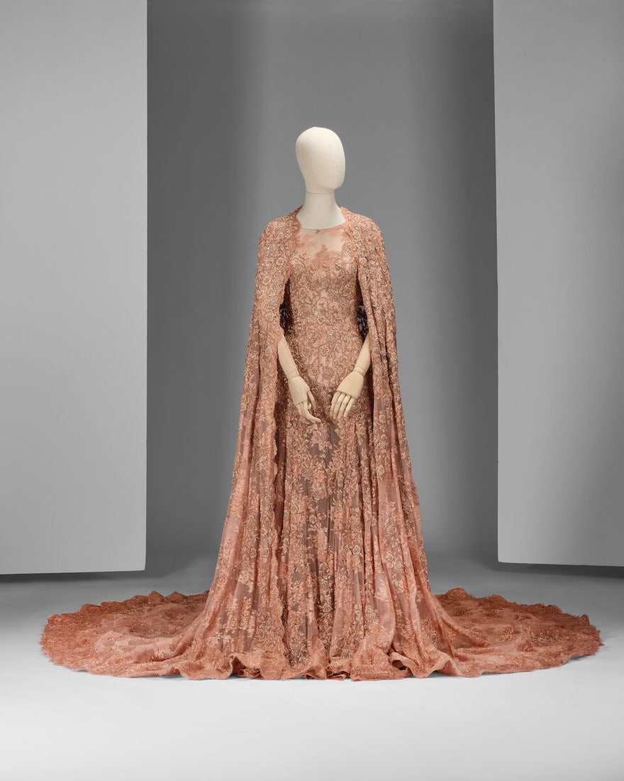 Ralph & Russo Haute Couture: Rose Gold Lace Gown and Cape Autumn/Winter 2015, Runway Look 13: Ralph & Russo Haute Couture: Rose Gold Lace Gown and Cape Autumn/Winter 2015, Runway Look 13 Pale pink and copper overlaid Chantilly lace gown with voluminous skirt, hand embellished with tonal ro