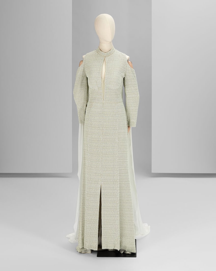 Ralph & Russo Haute Couture Exclusive: Mint Embroidered Tulle Gown: Ralph & Russo Haute Couture Exclusive: Mint Embroidered Tulle Gown Mint embroidered tulle gown featuring long flared sleeves and a flowy silk chiffon cape Approximate measurements: Chest 39', wais