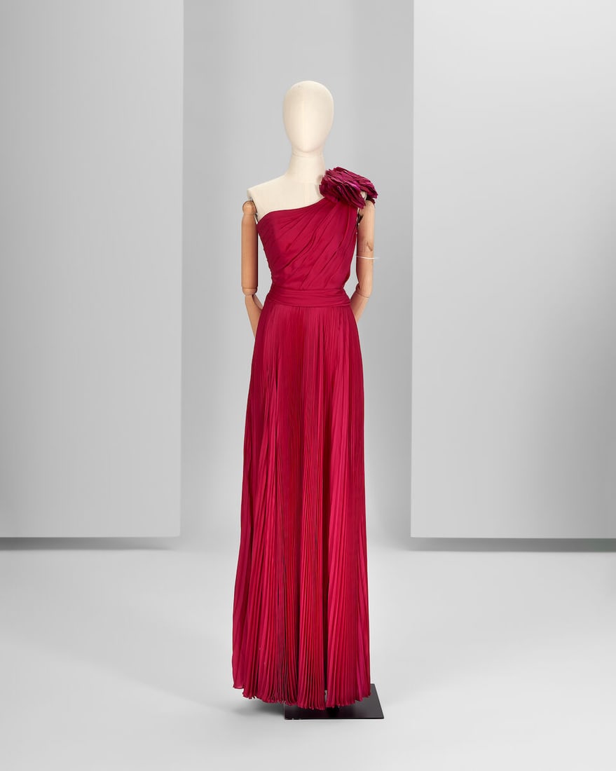 Ralph & Russo Haute Couture Exclusive: Raspberry Red Silk Chiffon Gown: Ralph & Russo Haute Couture Exclusive: Raspberry Red Silk Chiffon Gown Raspberry red hand-pleated asymmetric silk chiffon gown featuring a silk gazar hand manipulated and embellished flower on the