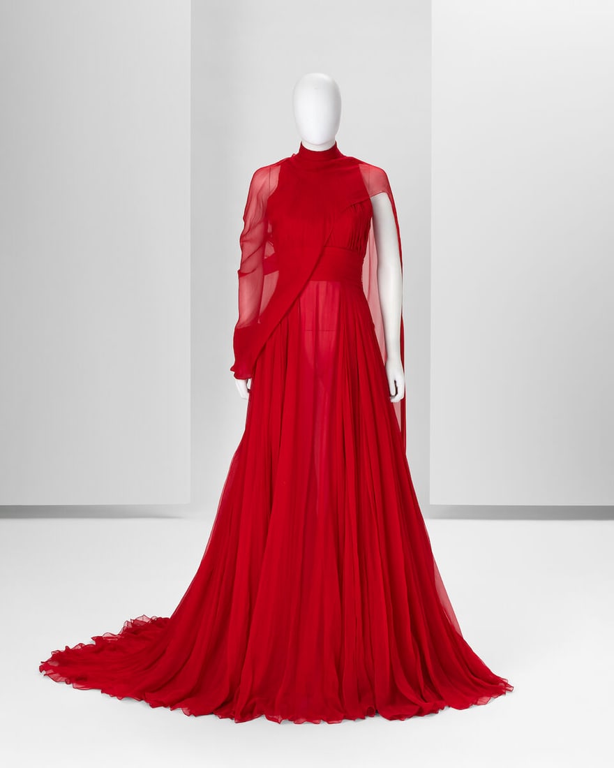 Ralph & Russo Haute Couture Exclusive: Raspberry Red Pleated Silk Chiffon Gown: Ralph & Russo Haute Couture Exclusive: Raspberry Red Pleated Silk Chiffon Gown Raspberry red hand pleated silk chiffon with high neck and hand pleated waist band, featuring an asymmetric floor