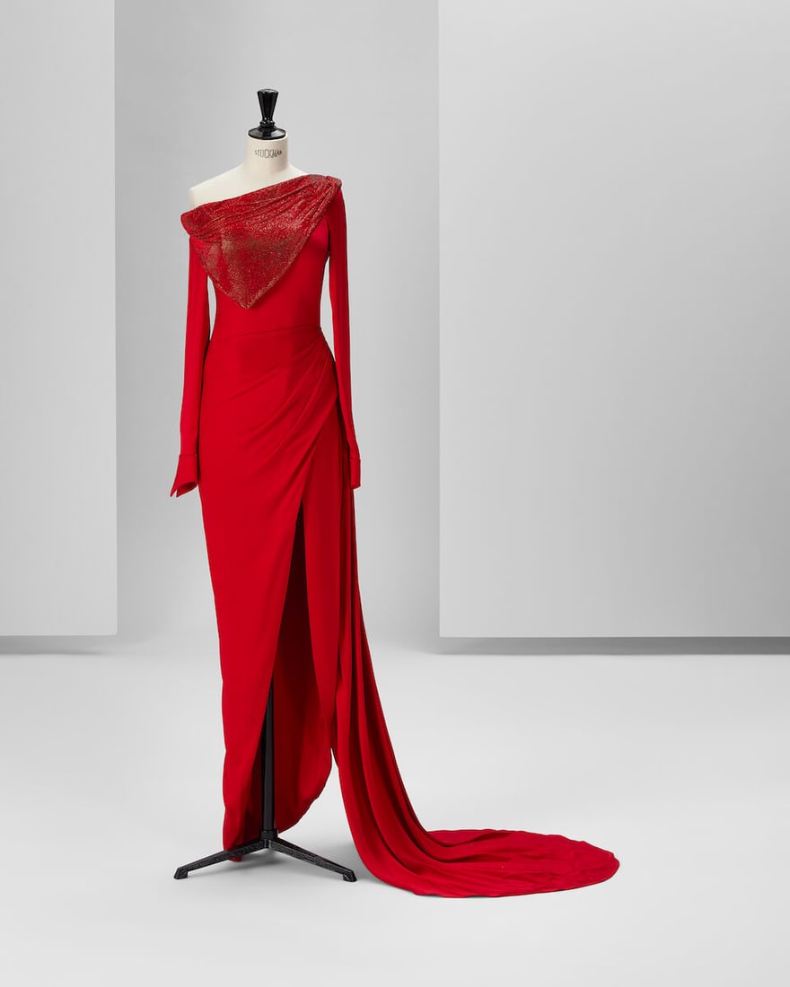 Ralph & Russo Haute Couture Exclusive: Red Silk and Crystal Gown: Ralph & Russo Haute Couture Exclusive: Red Silk and Crystal Gown Red double silk satin gown with asymmetric neckline featuring a hand embroidered crystal mesh drape and thigh high side slit Approx
