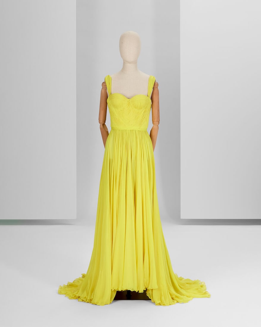 Ralph & Russo Haute Couture: Acid Yellow Chiffon Gown Autumn/Winter 2018, Runway Look 12: Ralph & Russo Haute Couture: Acid Yellow Chiffon Gown Autumn/Winter 2018, Runway Look 12 Acid yellow hand pleated chiffon gown featuring a woven bodice and shoulder sash Approximate