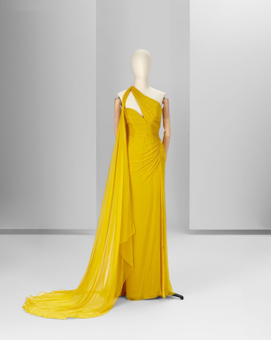 Ralph & Russo Ready to Wear: Mustard Yellow Evening Dress: Ralph & Russo Ready to Wear: Mustard Yellow Evening Dress Mustard yellow silk chiffon gown with sweetheart bodice featuring hand pleated motif and a side drape Labelled size 40 Footnotes: Design I