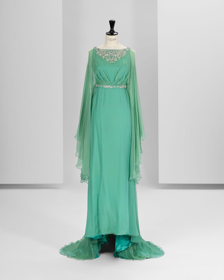 Ralph & Russo Haute Couture Exclusive: Light Teal Textured Silk Chiffon Fishtail Dress: Ralph & Russo Haute Couture Exclusive: Light Teal Textured Silk Chiffon Fishtail Dress Textured silk chiffon full-length fishtail dress with kaftan sleeves, embellished with a metallic silver hand