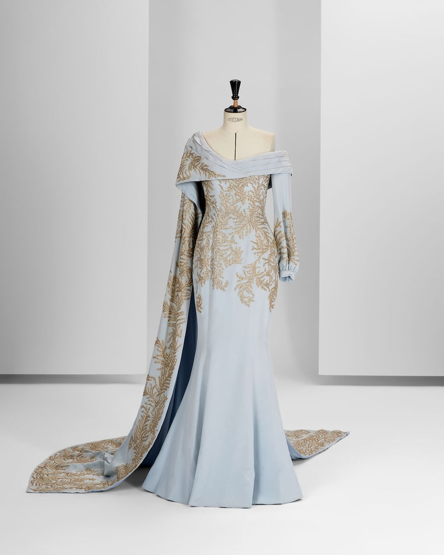 Ralph & Russo Haute Couture Exclusive: Pale Blue Silk Embellished Gown: Ralph & Russo Haute Couture Exclusive: Pale Blue Silk Embellished Gown Pale blue back silk crêpe long asymmetric fishtail gown featuring an L-shaped neckline adorned by a pleated motif along