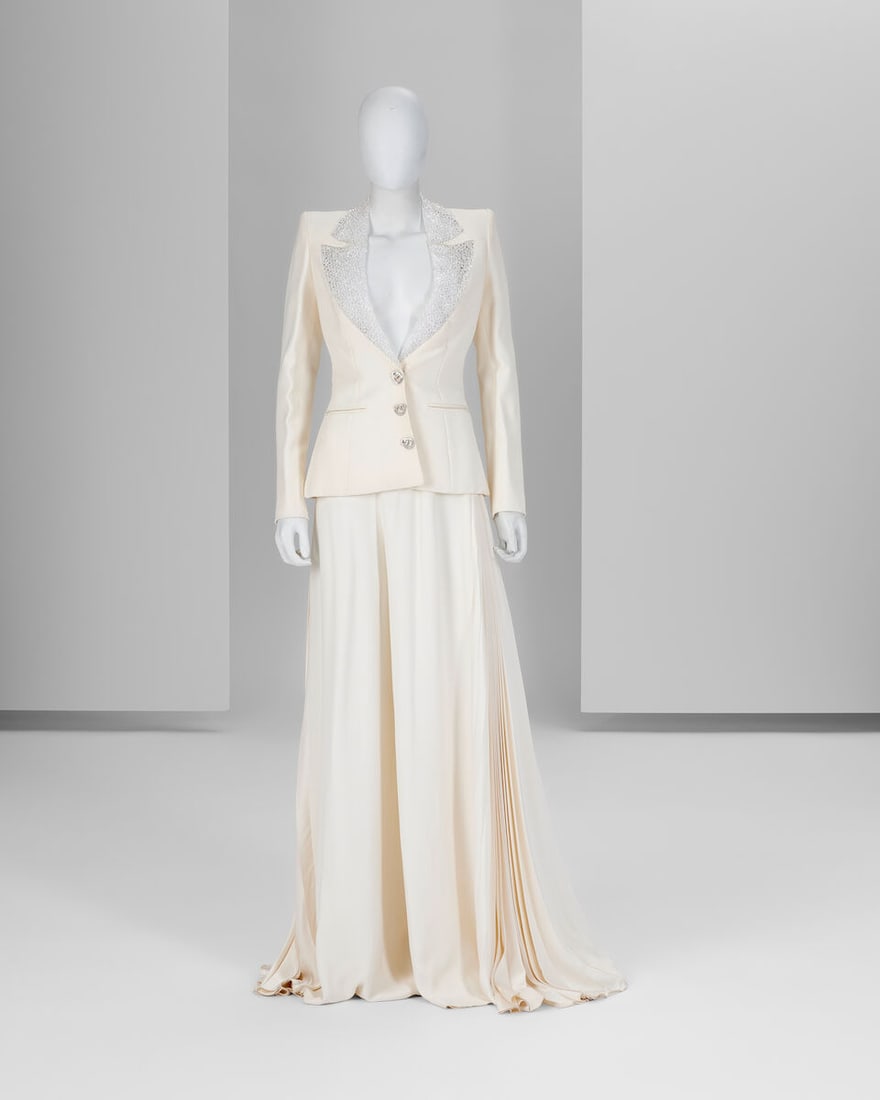 Ralph & Russo Haute Couture: Off-White Silk Trouser Suit Autumn/Winter 2018, Runway Look 3: Ralph & Russo Haute Couture: Off-White Silk Trouser Suit Autumn/Winter 2018, Runway Look 3 Off-white silk crêpe suit jacket featuring a sheer chainmail trompe l'oeil tuxedo collar and jewelle