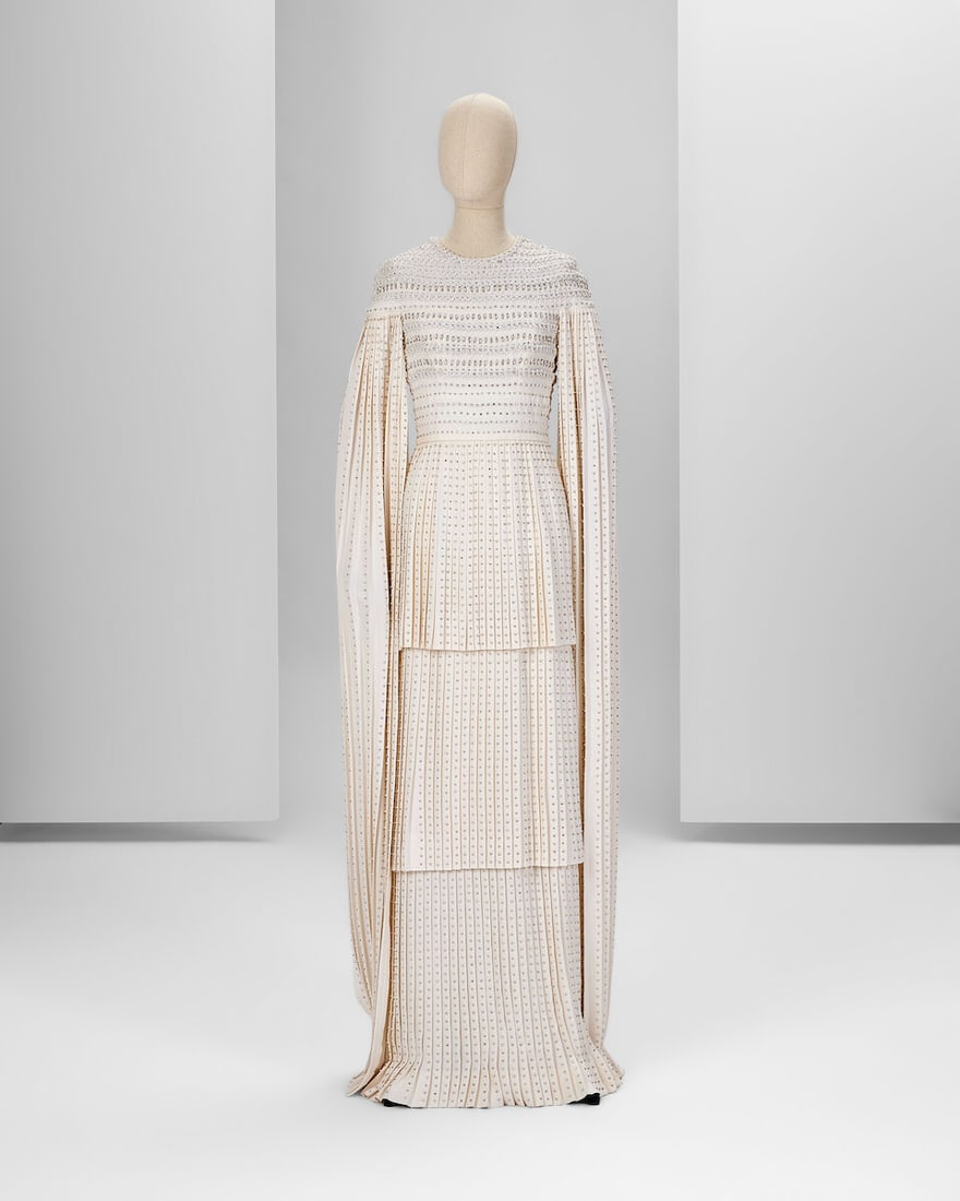 Ralph & Russo Haute Couture: White Crêpe Embroidered Gown Autumn/Winter 2017, Runway Look 2: Ralph & Russo Haute Couture: White Crêpe Embroidered Gown Autumn/Winter 2017, Runway Look 23 White crêpe gown with pleated layers and cape sleeves, hand embroidered with silk and