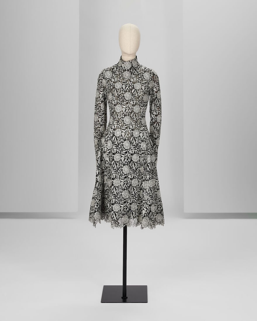 Ralph & Russo Haute Couture Exclusive: Metallic Gunmetal Guipure Lace Dress: Ralph & Russo Haute Couture Exclusive: Metallic Gunmetal Guipure Lace Dress Metallic gunmetal guipure lace long sleeved flared dress with3D elements and metallic feather applique Approximate measu