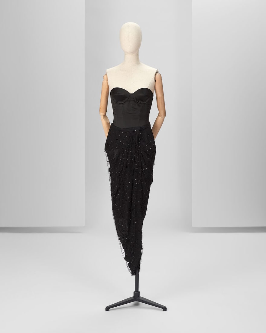Ralph & Russo Haute Couture Exclusive: Black Embellished Net Skirt and Satin Bustier: Ralph & Russo Haute Couture Exclusive: Black Embellished Net Skirt and Satin Bustier Black embellished lace net midi wrap over skirt with side round slit, thigh high, together with a double silk s
