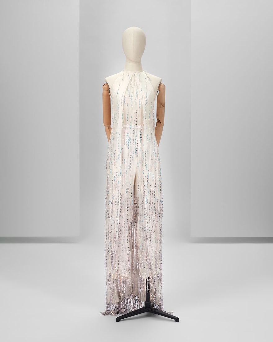 Ralph & Russo Haute Couture: Pearlescent White Silk Georgette Jumpsuit and Cape Autumn/Winter 20: Ralph & Russo Haute Couture: Pearlescent White Silk Georgette Jumpsuit and Cape Autumn/Winter 2019, Runway Look 17 Pearlescent white lurex silk georgette jumpsuit and cape featuring iridescent seq