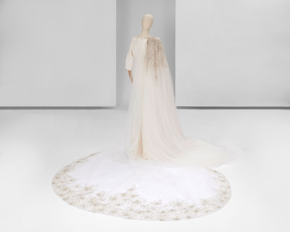 Ralph & Russo Haute Couture Exclusive: White Tulle Bridal Cape and Veil: Ralph & Russo Haute Couture Exclusive: White Tulle Bridal Cape and Veil White tulle detachable bridal cape embellished with a star motif hand embroidery growing from the shoulder and along edges,