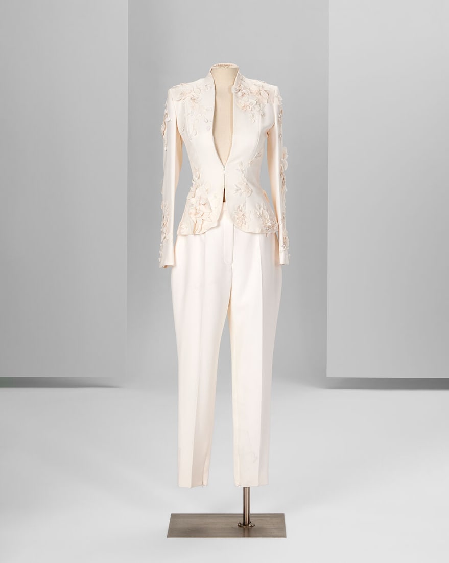 Ralph & Russo Haute Couture Exclusive: Off-White Embellished Silk Matched Trouser Suit: Ralph & Russo Haute Couture Exclusive: Off-White Embellished Silk Matched Trouser Suit Off-white silk back crepe tailleur with short and fitted collarless jacket embellished with hand crafted silk