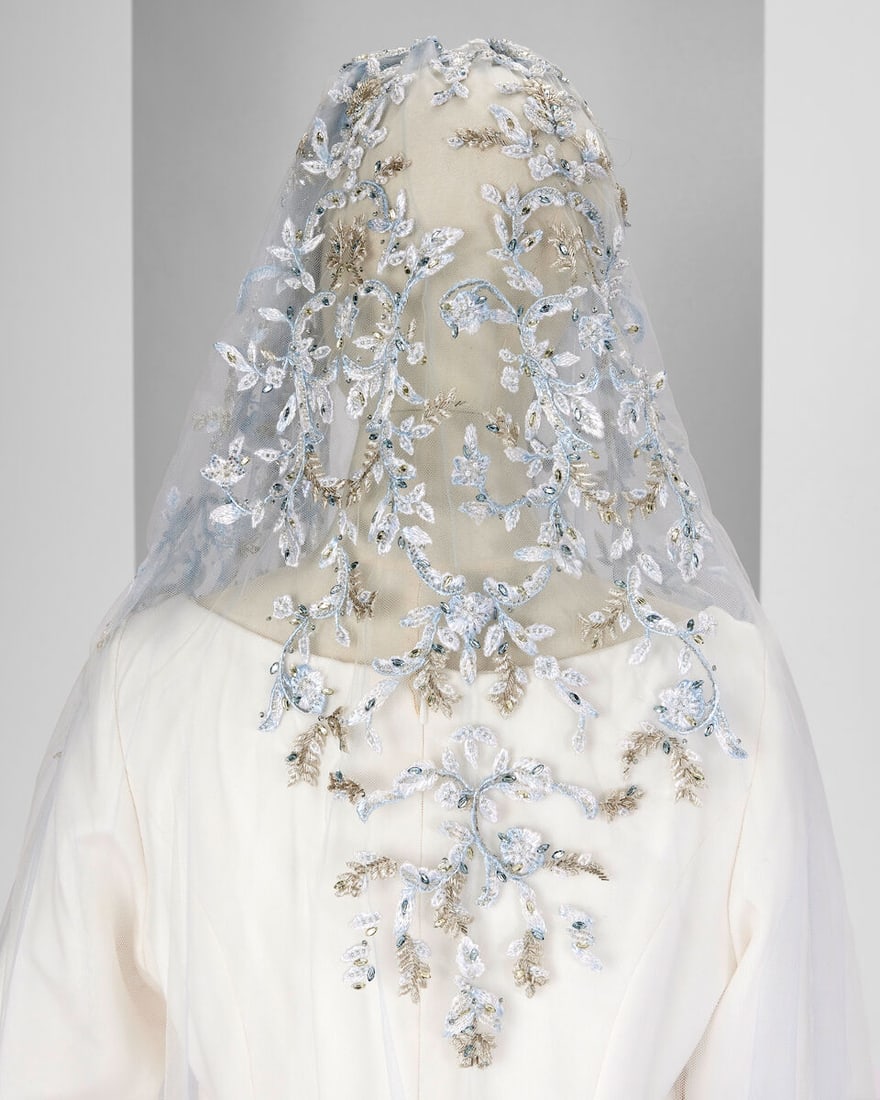 Ralph & Russo Haute Couture Exclusive: Pale Blue Tulle Bridal Veil: Ralph & Russo Haute Couture Exclusive: Pale Blue Tulle Bridal Veil Pale blue tulle bridal veil adorned with hand made and hand stitched silk flowers Approximate measurements: Length 38', width