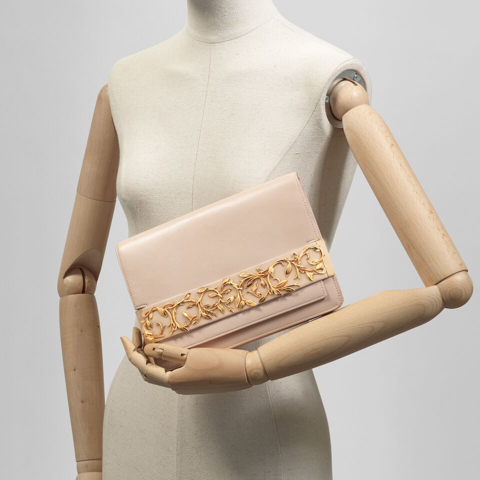 Ralph & Russo Ready to Wear: Pale Pink Calfskin Eden Clutch: Ralph & Russo Ready to Wear: Pale Pink Calfskin Eden Clutch Pink leather with rose gold tone hardware, leaf embellishments at front panel, exterior slip pocket at back, tonal leather lining,