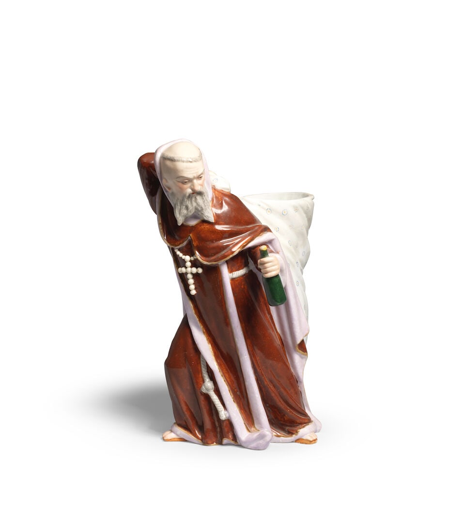 A large German porcelain figural vase in the shape of a monk carrying a sack, 19th century (1 of 2)