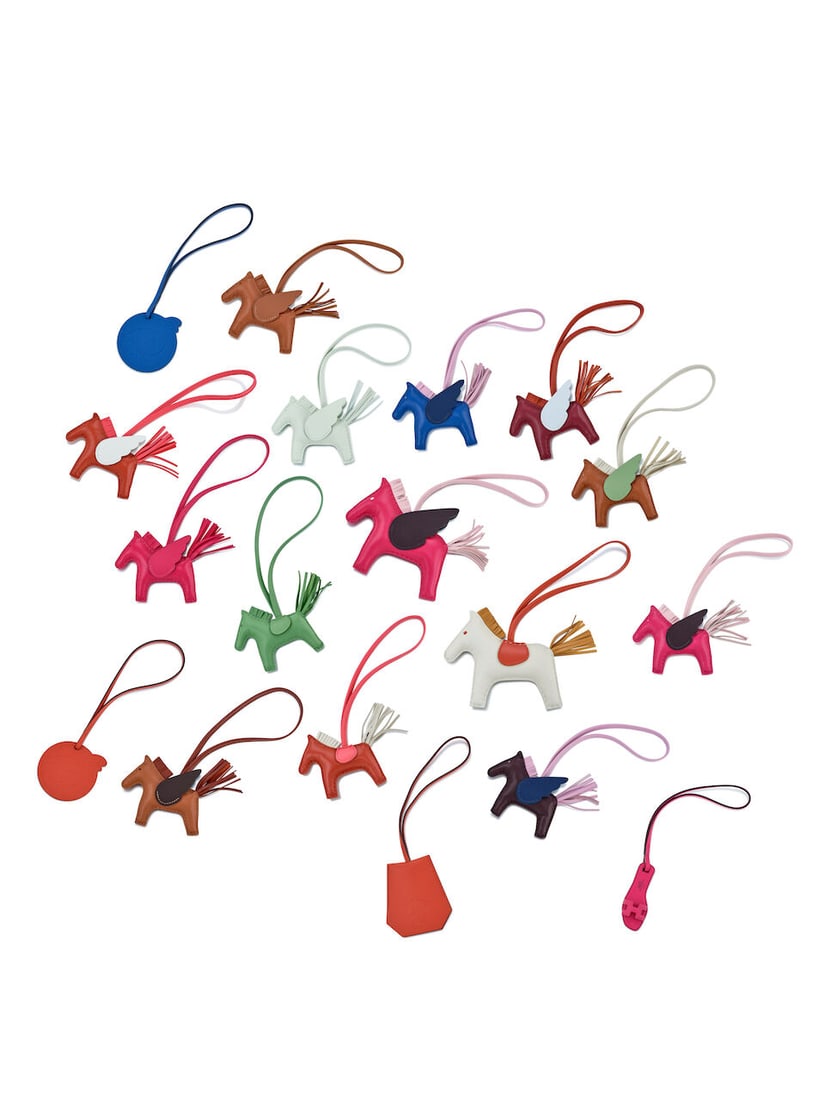 (NO RESERVE) HERMÈS: A SET OF 18 BAG CHARMS: (NO RESERVE) HERMÈS: A SET OF 18 BAG CHARMS 愛馬仕： 手袋掛飾18件套裝 A set of 18 multicolor bag charms in Milo