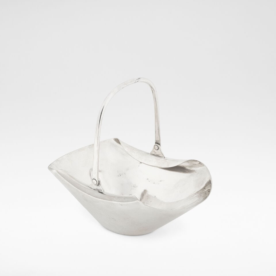 Christopher Dresser for Hukin & Heath Sugar basin, model no. 2074, circa 1885: Christopher Dresser for Hukin & Heath Sugar basin, model no. 2074, circa 1885 Electroplated metal, the curved rim mounted with an articulating handle. 14.5 cm high, 17 cm wide, 17 cm deep Stamped