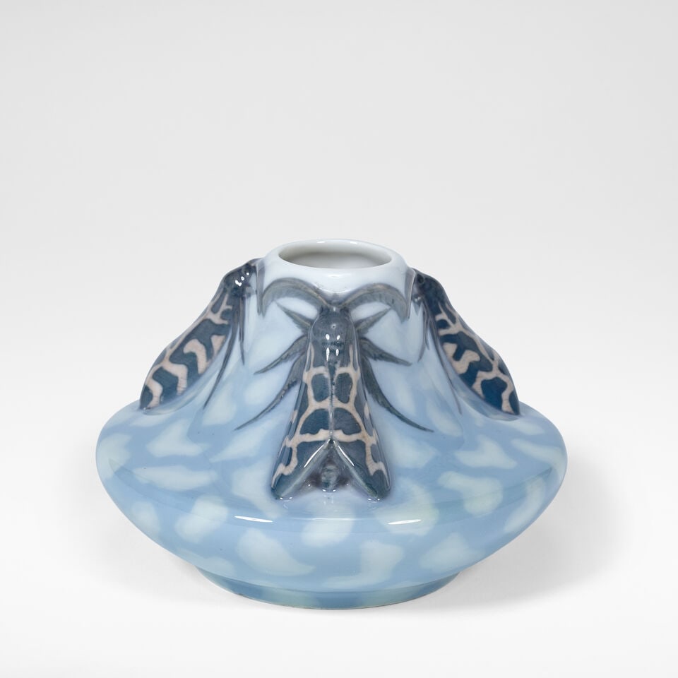 Christian Thomsen for Royal Copenhagen Vase, circa 1900: Christian Thomsen for Royal Copenhagen Vase, circa 1900 Porcelain, modelled in high relief with decoration of tiger moths. 12 cm high, 13 cm diameter The underneath with underglaze blue and stamped fa