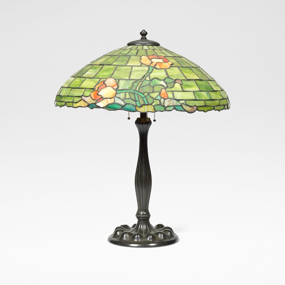Duffner & Kimberly Table lamp, circa 1910: Duffner & Kimberly Table lamp, circa 1910 Leaded glass and patinated metal, the shade with motifs of poppies or roses. 59 cm high, 48.2 cm diameter Footnotes: Provenance With the Minna Rosenblatt